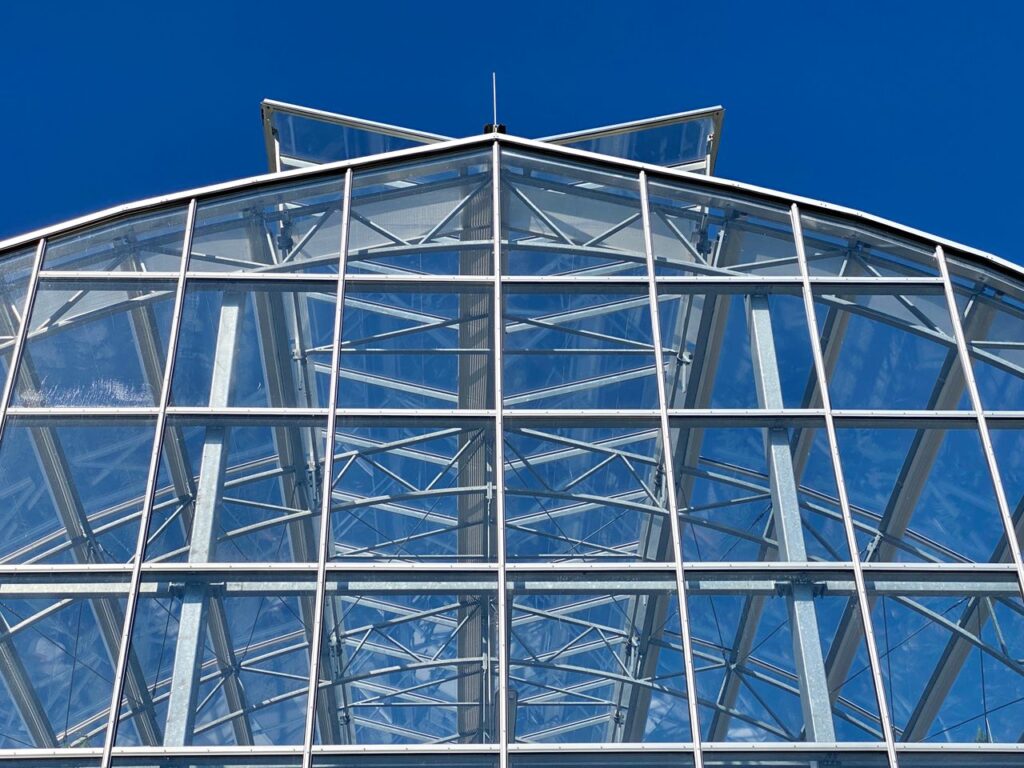 Mastering the First Impression: Your intriguing post title goes here Clear sky reflection in a modern glass building structure, Überlingen, Germany.